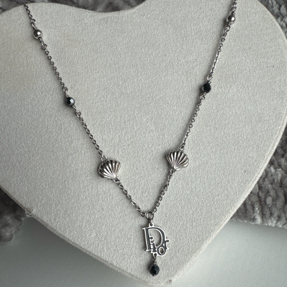 Silver Shell Pendant Necklace with Black Bead Accent